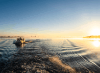 Met de woonboot over de Binnenmüritz bij zonsopgang