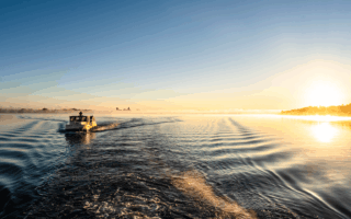 Met de woonboot over de Binnenmüritz bij zonsopgang